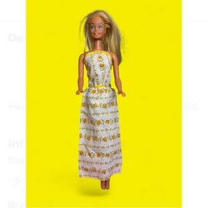 1970’s vintage Barbie Doll dress in Yellow Floral Dress
